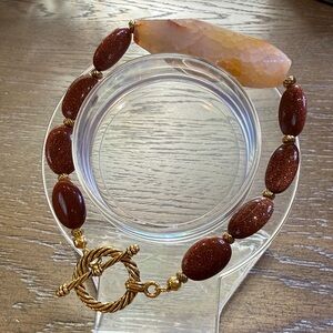 Elegant Handmade Goldstone Bracelet with Gold Accents